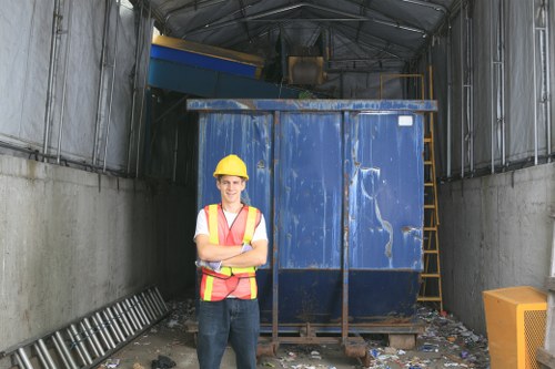 Workers sorting recyclables at a transfer station